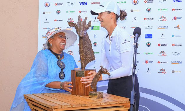 Magical Kenya Ladies Open: All Smiles As German Esther Henseleit Receives Victory Trophy FrOm First Lady Margaret Kenyatta